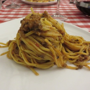 Little homemade tagliatelle with sauce made with tomato, chicken liver and sausage